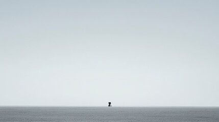 Obraz premium Lonely structure on expansive barren landscape