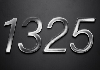 Chrome metal 3D number design of 1325 on grey background.