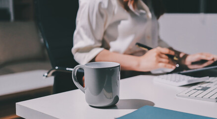 Expert woman asian female people review data number costing managerial account prepare monthly actual cost variance report at tax audit office. ESG sheet budget control ERP process service project.