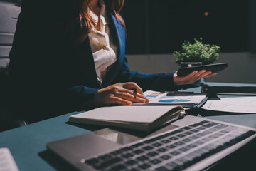 Expert woman asian female people review data number costing managerial account prepare monthly...