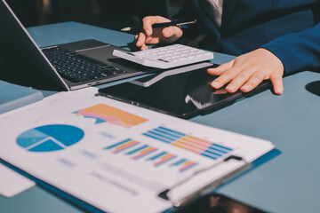 Expert woman asian female people review data number costing managerial account prepare monthly...