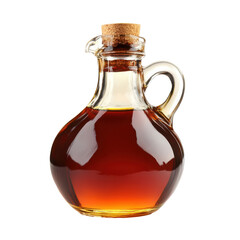 Rich amber maple syrup in a glass jug with cork stopper displayed on a neutral background
