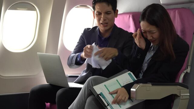 Turbulence and Tears: A passenger's stressful flight experience, depicted through the concerned expressions of two individuals. The photo encapsulates the discomfort, and shared struggle of travel.