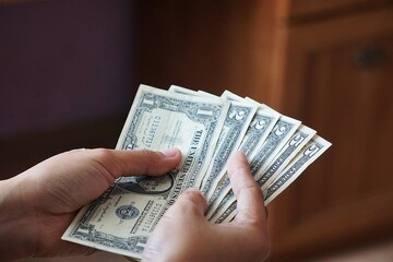 American dollars, cash payment, investing