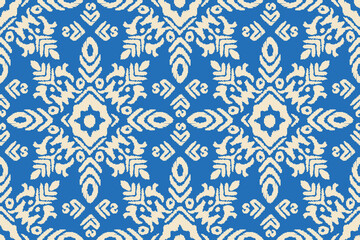 Ikat abstract background art. Ethnic tribal boho seamless wallpaper. Motif floral handmade seamless pattern block print batik vector ajrakh. Design for fashion, fabric, textile, wallpaper,wrapping