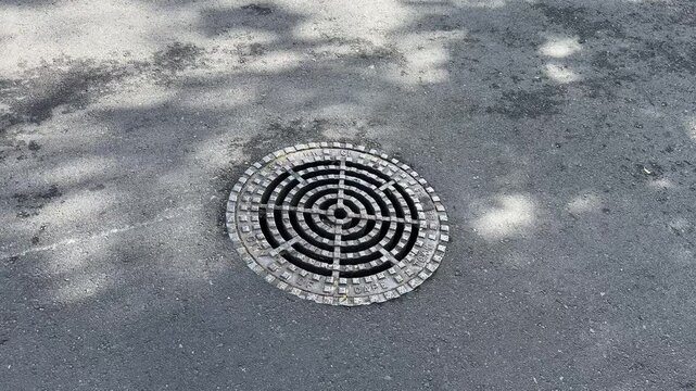 Sewer drain cover or. drain top on a street in Cape Town.