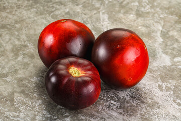 Black ripe juicy organic tomato