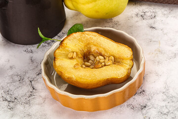 Baked quince with honey and cedar