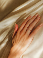 Fototapeta premium Close-Up of Elegant Hand with Manicure and Ring