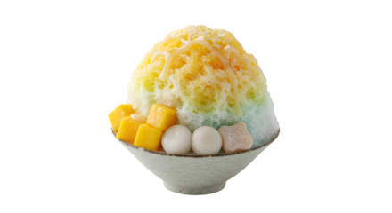 Colorful shaved ice dessert with mango and sweet toppings.  Layers of rainbow colored ice, topped with a golden drizzle.  Mango cubes and round sweet balls are nestled within