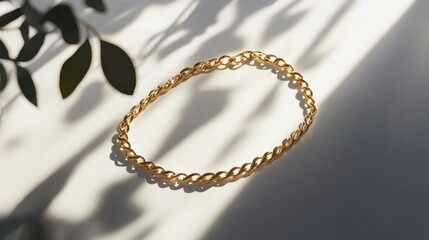 Fototapeta premium Gold chain bracelet, sunlight shadows