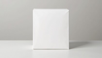 single white product box, soft highlight from above