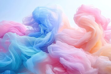 Fototapeta premium Colorful, ethereal fabric swirls create a dreamy, soft abstract cloud of pastel shades