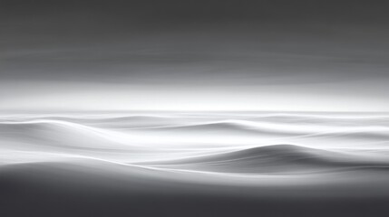 Gray and white, hazy landscape of gentle waves.