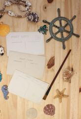 Beach Background With Vintage Post Cards and Shells