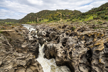 The Leap of the wolf, Pulo do Lobo waterfall in the Guadiana Valley Natural Park at Mertola,...