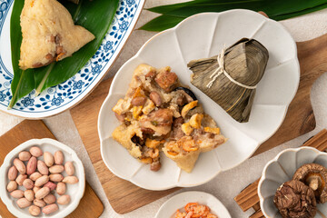 Zongzi, rice dumpling for Dragon Boat Festival on white table background.