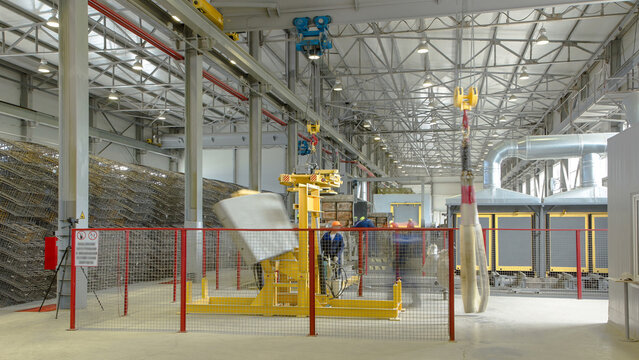 The operator lifting device timelapse, lift loads using lifting magnet, mechanical workshop, metal structures plant.