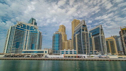 Obraz premium Dubai Marina towers in Dubai at day time timelapse hyperlapse