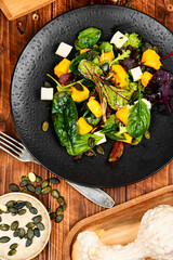 Salad with blackberries, avocado.