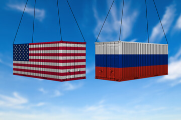 USA and Russia trade war concept. US of America and Russian flags crashed containers on sky at...