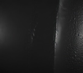 Deep black leather with subtle grain, high-gloss finish ,  automotive,  close-up,  rich