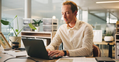 Fototapeta premium Business, man and typing on laptop with documents for budget report, company audit and performance review. Accountant, employee and technology with paperwork for finance management and writing email
