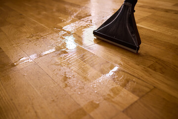 The comprehensive Wood Floor Cleaning Process utilizing a Wet Vacuum for optimal results