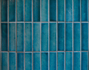 Tiles. A closed up texture of beautiful blue tiles for background pattern. Vintage film grained filter applied.