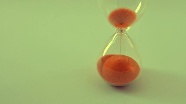 Hour glass with sand running out