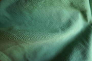 Rumpled simple unprinted juniper green cotton fabric