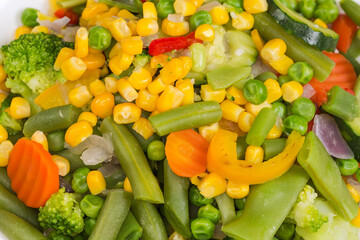 Boiled mixture of the different vegetables close-up