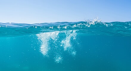 Obraz premium Water Surface with Splashes and Bubbles