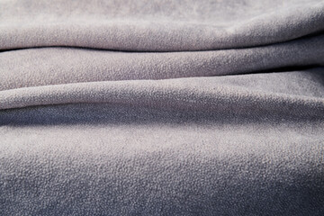 Close-Up of Soft Gray Fabric Showing Textured Material Background