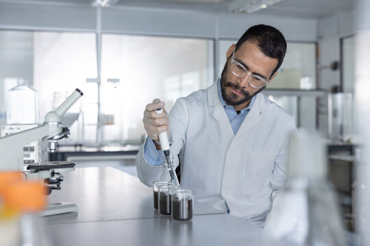 Scientist Performing  Work with soil Samples