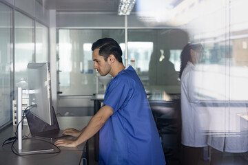 Medical Professional Concentrated on Computer Work