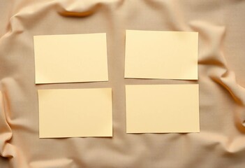 Blank paper cards on beige and ginger linen, top view,   minimal,   card template