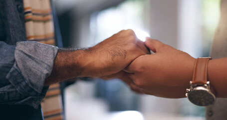 Fototapeta premium Closeup, holding hands and couple with love, people and date with romantic support or marriage. Person, gratitude and relationship with trust, hope and relax with empathy, home and respect or care