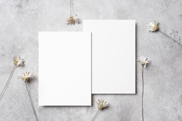Two blank wedding invitation cards mockup front and back sides for card design presentation, flat lay with copy space