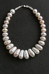 Elegant pearl necklace showcasing unique shapes and lustrous she