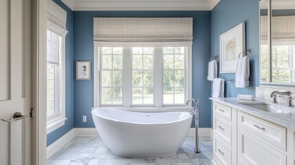 Luxurious bathroom with freestanding bathtub, marble floor, and blue walls.