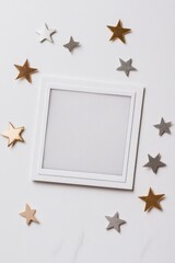 Empty frame surrounded by shiny stars creates whimsical, dreamy