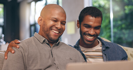 Home, gay couple or men with laptop, movie or smile for laughing at funny joke in lounge. Comedy humor, lgbtq or happy people on technology together in house with queer partner for streaming film