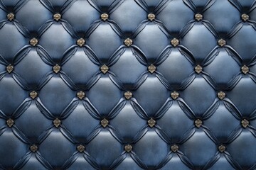 Deep blue tufted upholstery with button detailing. Elegant diamond pattern texture