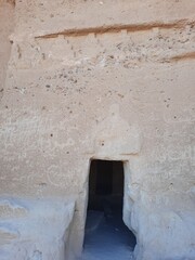   A beautiful daytime view of the caves carved into the mountains of Madyan Shuaib. This archaeological site is located in the Al Bada Governorate in the Tabuk region of Saudi Arabia.