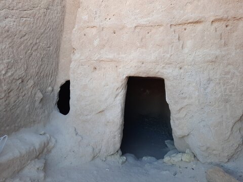   A beautiful daytime view of the caves carved into the mountains of Madyan Shuaib. This archaeological site is located in the Al Bada Governorate in the Tabuk region of Saudi Arabia.