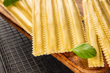 Parpadelle stuffing mushrooms pasta dish vegetables fresh delicious gourmet food background on...