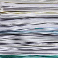 In this close-up photograph, a substantial pile of paper documents takes center stage, showcasing the overwhelming nature of paperwork The stack consists of numerous sheets of paper, creating a