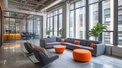 A blurry, stylish office with gray colors, big windows, glass walls, and pops of orange.
