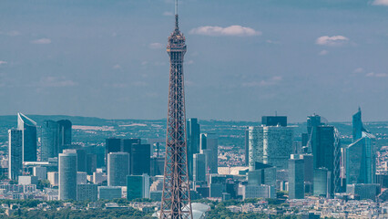 Aerial view from Montparnasse tower with Eiffel tower and La Defense district on background...